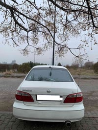 نیسان ماکزیما ✈ V6 مۆدێل ٢٠٠٢ ئیسترا خاص ١ پارچەی بۆیاخە  جگە لەوە هەم...