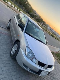 لانسر ٢٠٠٧ • اوتوماتيك • بدون حادث