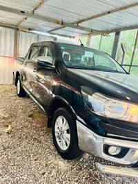 تويتا هايلوكس 2023ساز مغلفه(ppfبالكامل) رقم بغداد الدولي مميز تحويل مب...