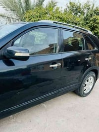 للبيع كيا سورنتو 2012 وارد امريكي رقم بغداد انكليزي بسمي  السياره مصبو...