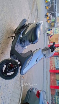 دراجه ماكس عدله لبيع مكفوله السعر 900 وبيه مجال رقم 07701753517