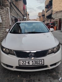 كيا سيراتوا 2011 بأسمي  كير ومكينه مكفولات شاشة  حساس  تدفئة وتبريد  ص...