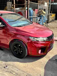 للبيع كيا فورتي موديل 2010 كوبيه تك باب لون ماروني غامق السياره رقم بغ...