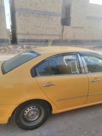 كيا اوبتيما • مكينة ٢٠٠٠ • فئة ٩