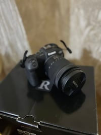 كاميرا كانون ار بي مليون و٣٠٠ مستعملة شهر واحد بس عدسه ٢٤-١٠٥ وياها را...