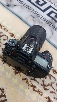 كامرة للبيع  نوع 7100 عدسة105/18 بطاريتين وشاحنة  السعر500  بغداد العب...