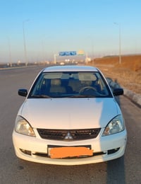 لانسر R • ٢٠١٠ • اوتوماتيك