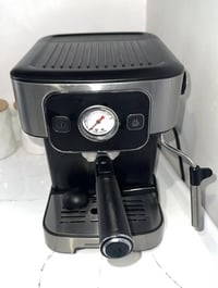 ماكينة قهوة • مستعملة مرة واحدة • قەڵادزێ