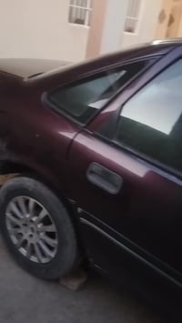 للبيع فكترا حجم 18 رقم الماني كير ومحرك شرط الاتصال 07730074915