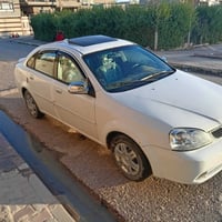 اوبترا2004سنوية لحد31كوبون بنزين موجود كيرو محرك بل شرط سيارة كلش نضيف...