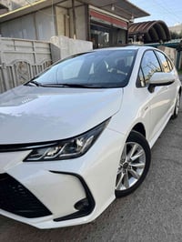 كورلا هايبرد موديل 2025  ممشى (9)  مكفولة  كفالة عامة  بغداد باسمي  07...