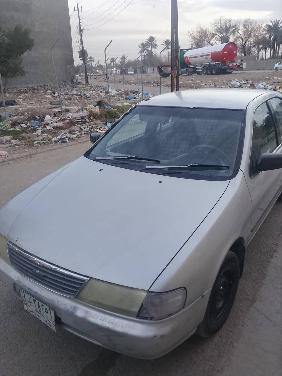 نيسان ياباني موديل 98 سياره حلوه ومرتبه رقم بغداد فقط يحتاج ترتيب بسيط سعر ٣٨ وبيها  مجال بسيط رقم الهاتف ***********
