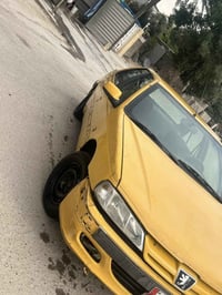 بيجو بارص موديل 2015 رقم بغداد الماني السياره لمالك واحد اني استلمتهة ...