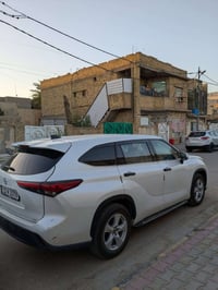 تويوتا هايلاندر  6سلندر رقم بغداد موديل 2022 ماشية 29الف ميل  7راكب 3ق...
