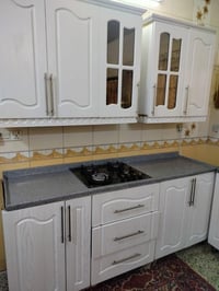كاونتر مترين + معلق +طباخ منضدي ومرشحه مكان الدورة