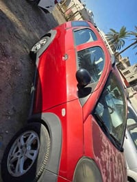 شيري X1 . موديل 2014 ماشيه 20 الف  [سيارة بيها بارد بالباب خلف السائق ...