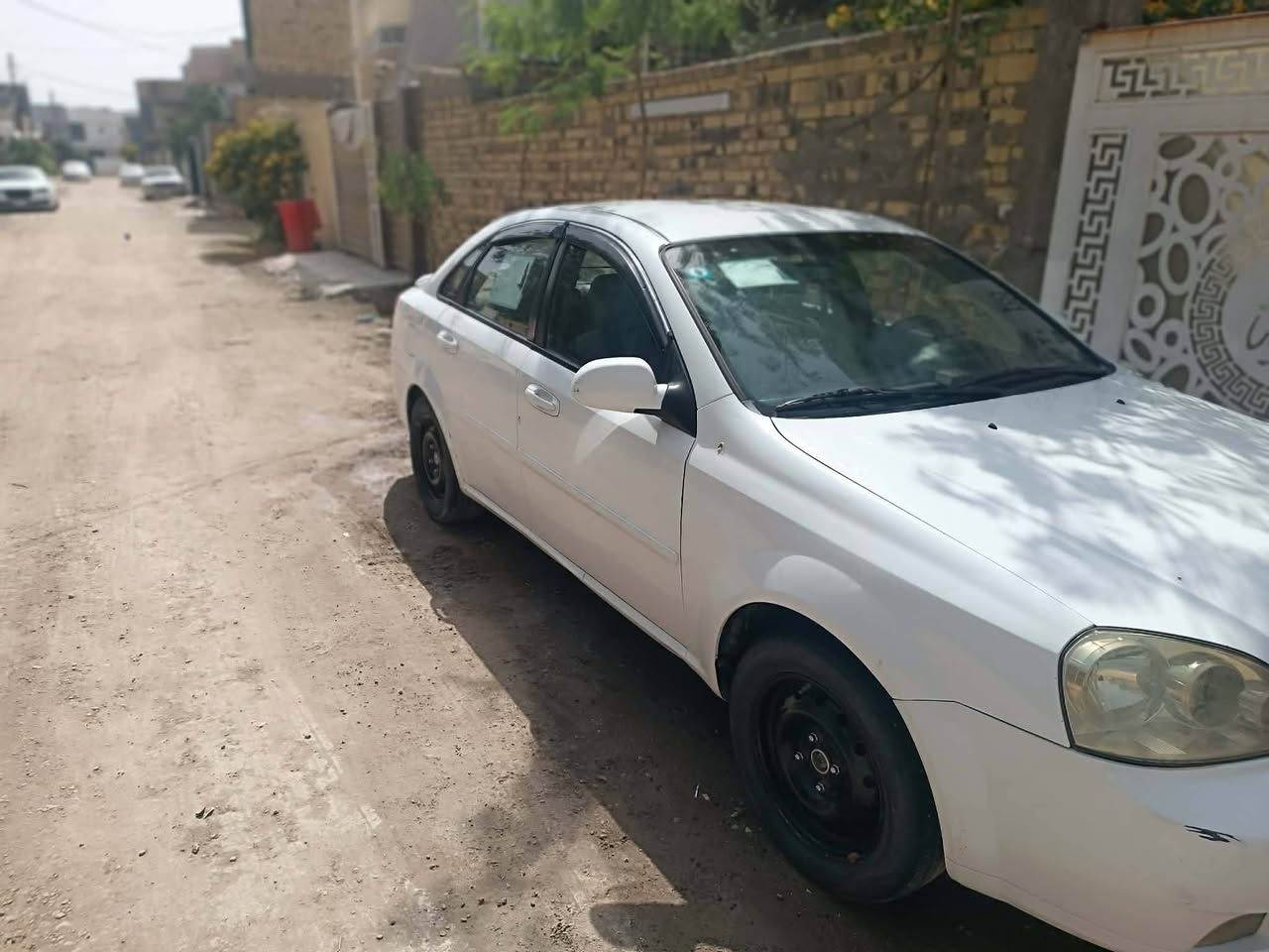 اوبترا موديل ٢٠١٢ مكفوله رقم بغداد بأسمى رقم انكليزي السعر ٩٠ وبيها مجال بسيط مكاني بابل مركز***********
