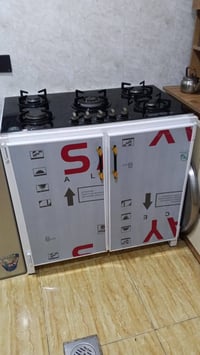 قنينة غاز • طباخ مستعمل • قاعدة ١١٥
