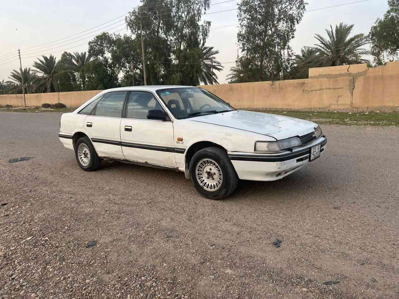 للبيع مازده بغداد رقم نكليزي سنويه لغاية 29 هزه جديده سعر 25$ رقم ‏‪***********‬‏  سياره محرك وكير عادي مكفولات حدادا جيد جداً كهربائيات شغاله ويل كب دواخل نضيفه مكاني بغداد
