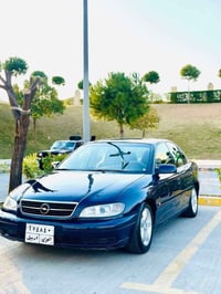 أوميغا ٢٠٠١ • جير أوتوماتيك • مكينة VVT ٣٠٠٠