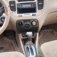 كية ريو موديل 12 للبيع السيارة مكفولة بس بيها طخة بسيطة بالجاملغ حدادي...