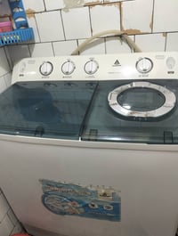 غسالة الحافط حجم 18 كيلو بعدهي جديدة تغسل بطانيه وتنشفه السعر اب 125 أ...