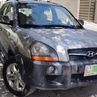 توسان ٢٠٠٩ • محرك ٢٠٠٠ • مكفولة صبغ