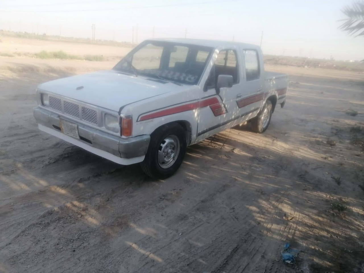 سياره نيسان موديل ٨٧ للبيع سنويه لغايه 29 العنوان ناصرية مدينة الصدر الاتصال على الرقم ***********
