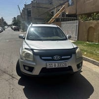 سبورتج 2009 خليجي  محرك 2000 ماشية 95 الف السيارا حلوة ومابيها نقص  سع...