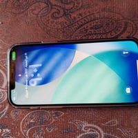 متوفر 12برو ماكس كامل كارتون وشاحنه اصليه بطاريه78بلاد مبدل كامره امام...