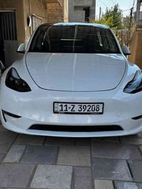 مكلف بالنشر   تيسلا y موديل 2023  اللون ابيض  لونك رينج السياره فول مو...