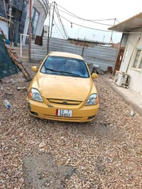 كيا ريو • ٢٠٠٥ • مكينة دخان