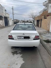 لانسر • ٢٠١١ • مكينة كبيرة