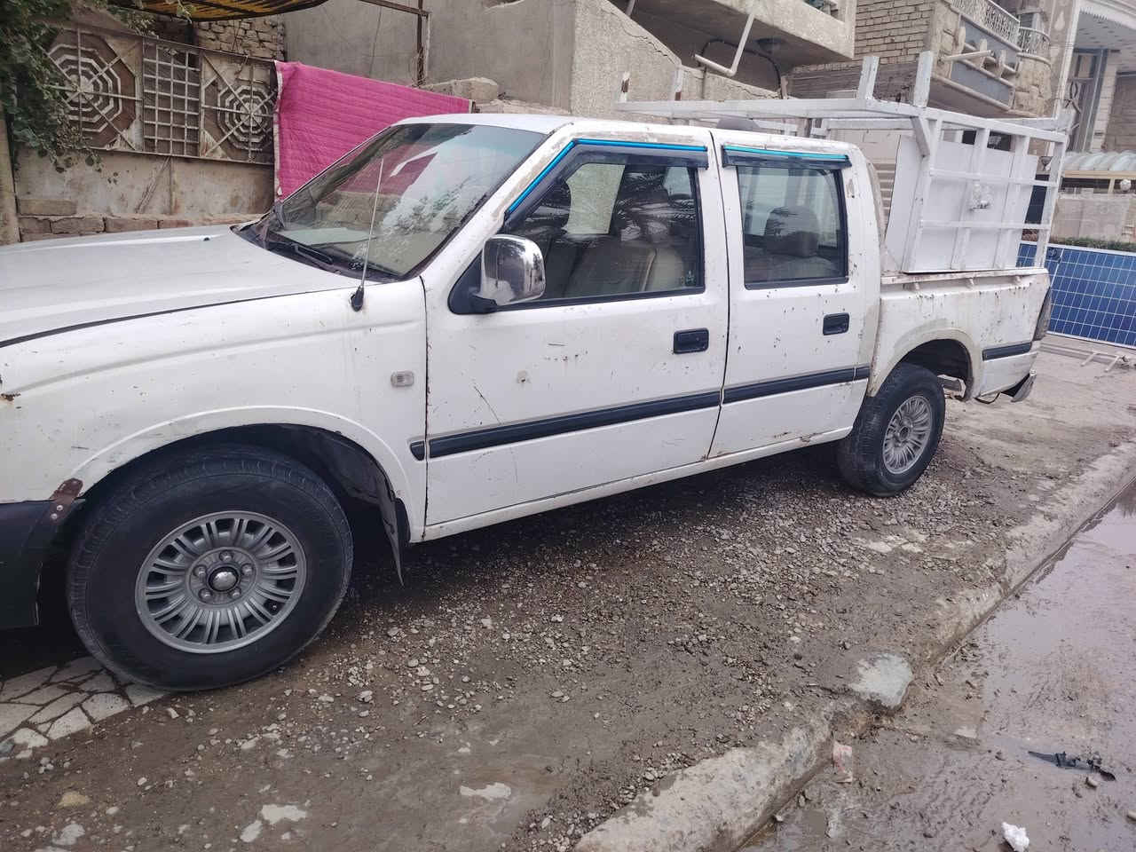 بيكم دبل قمارة نوع تويوها صيني موديل 2005 كير ومحرك 2y بيها خيط تبخير بس لا تصرف ولاتنقص السعر 25 وبيها مجال بسيط ***********
