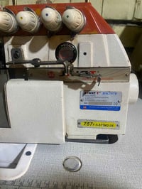 اوفر جاك • مستعملة • مكينة جديدة