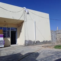 للبيع مساحه 300متر ع طريق السنيه خلف معمل اصباغ كيان 07811510423