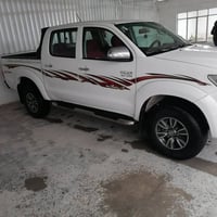 سياره هيلوكس 2014 كير عادي مكفولة من صبغ وحداديه فقط محرك مفتوح  السعر...