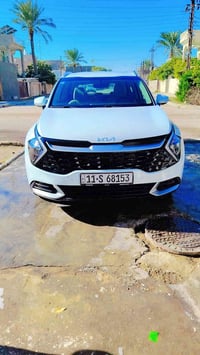 كيا سبورتج   موديل2023 خليجي نص فول  ماشيه 50  رقم بغداد - تحويل مباشر...