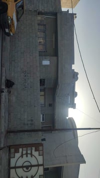 حي الملايين • ٢٢٠م • عل شارع