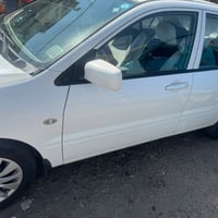 لانسر 2011 سيارة جاهزة من كلشي رقم بغداد 07712416842