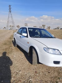 مازدە 323 • ٢٠٠٤ • رقم أربيل