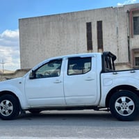 نيسان نافارا • ٢٠٠٩ • مكينة مجددة