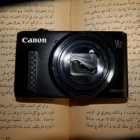 كاميرا canon powershot sx610hs بيها مشكلة صغيرة فقط باب العدسة الجوة م...