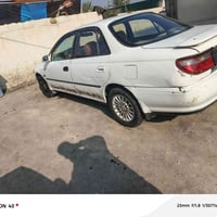 كارينا مديل ١٩٩٤ كما واظحه بلصوره السياره مال عيشه والصدر شويه تعبان ب...