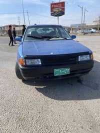 مازدا ٣٢٣ • مكينة ١٦ • تكييف وباور