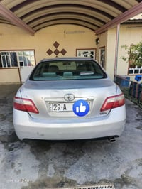 كامري 2007 وارد أمريكي LE حادثها الجاملغ الخلفي الايسر  وبيها صبغ بنفس...