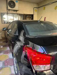 هونداي رينا موديل 2020 خليجي مكفوله من الصبغ  بيها طخات بسيطه ماشيه 12...