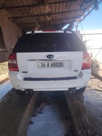 سياراة سبوتج موتيل الفن 2008البيع 80ورقه بيه مجل رقم تلفون 07808299251