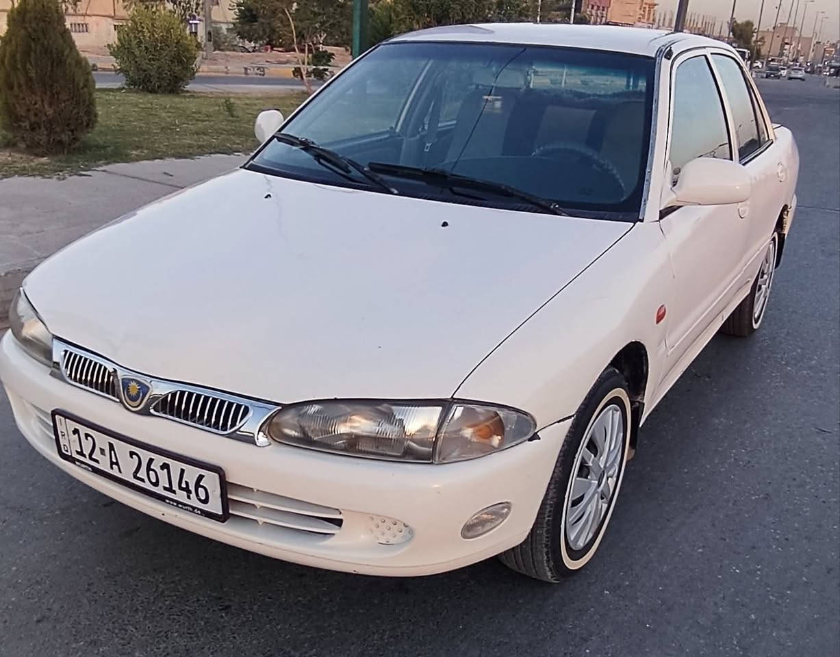 بروتون موديل 2002 للبيع (كير عادي)
​النوع: بروتون (Proton)
​الموديل: 2002
​المنظومة: كير عادي (عادي)
​اللون: أبيض
​البودي: صبغ حزم للجمالية (بدون دواخل، الدواخل سليمة تماماً).
​الأضرار: تبديل جاملغ سكن (أمامي) شغل مؤسسة.
​التبريد: شغال.
​الكهربائيات: شغال الكل، ما بيها أي نقص كهربائي.
​الميكانيك: كير ومحرك بشرط الفحص والجاهزية.
​التواير: طخم تاير جديد.
​الأوراق والتحويل: السنوية نافذة لغاية 2028، السيارة باسمي والتحويل بشرط.
​الإضافات: كوبون البانزين الإلكتروني جاهز وموجود مع السيارة.
​السعر: [ 38 ] وبيه مجال للشراي الطيب.
​المكان: نينوى / حي المطاحن الجانب الايمن 
​للاتصال والاستفسار: ***********
