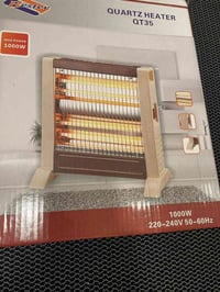 هيتر كهربائي • ٤ شمعات • جديد بالكارتون